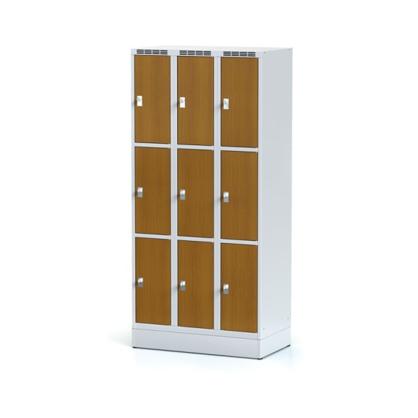 Šatníková skrinka na sokli s úložnými boxami, 9 boxov 300 mm, laminované dvere čerešňa, otočný zámok